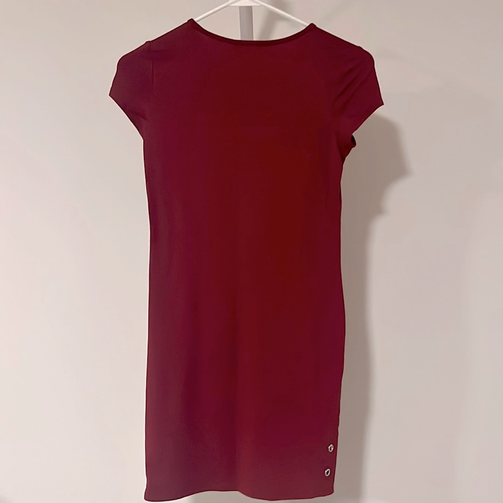 Girls 10/12 Shift Dress. Deep red shade with cute grommet detail.
